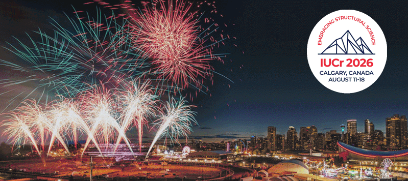 Photograph of Calgary with fireworks and the logo of the IUCr congress.